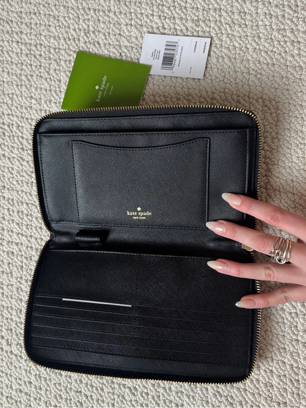 kate spade Black Zip-Around Continental Wallet with Gold Logo